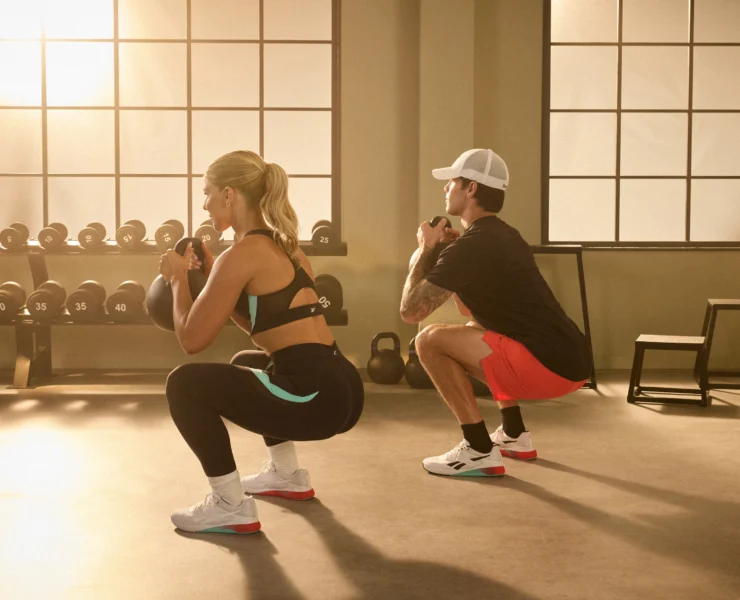 a man and woman training in the new Reebok Nano X5 Training Shoes