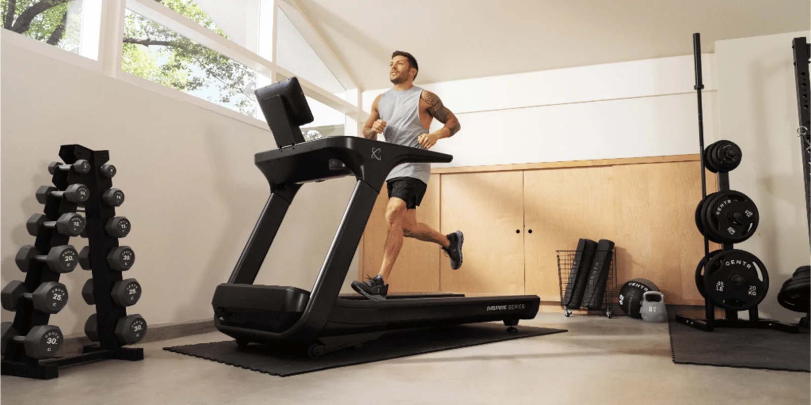 a man running on a new Centr treadmill