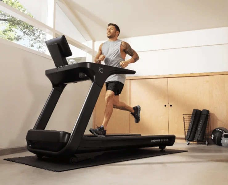 a man running on a new Centr treadmill