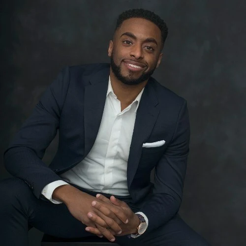 a smiling headshot of Crunch president Chequan Lewis
