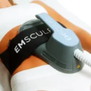 a client receiving BTL's Emsculpt Neo, which has been added to Alo Wellness Clubs