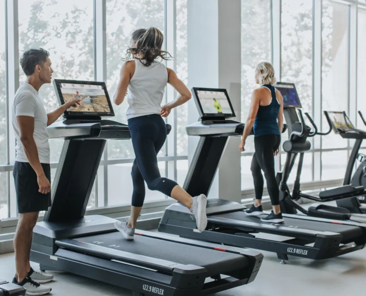 People on treadmills at gym