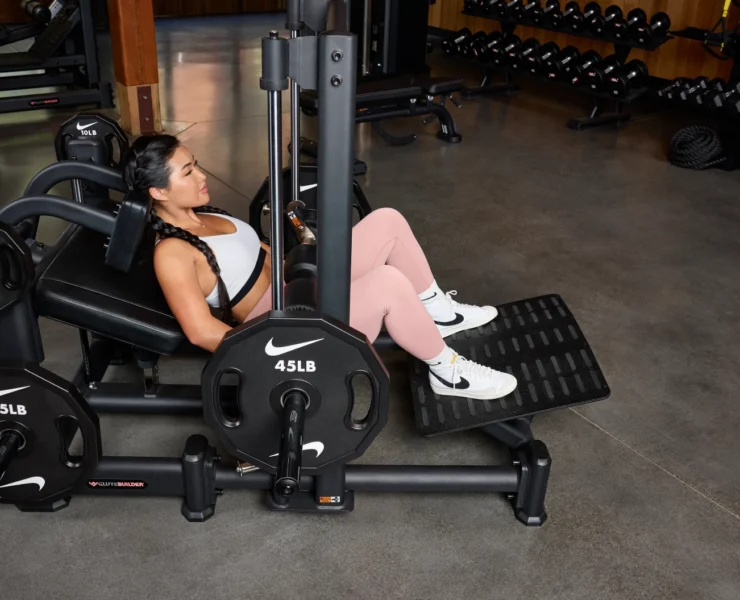 Woman using hip thrust machine