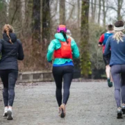 three woman running outside/physical activity