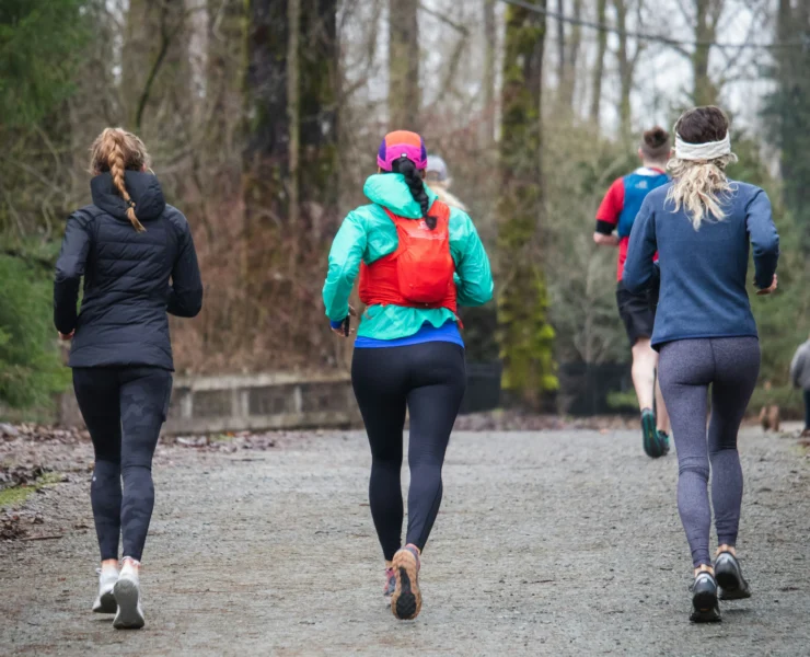 three woman running outside/physical activity