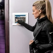 Woman signing into a group fitness class