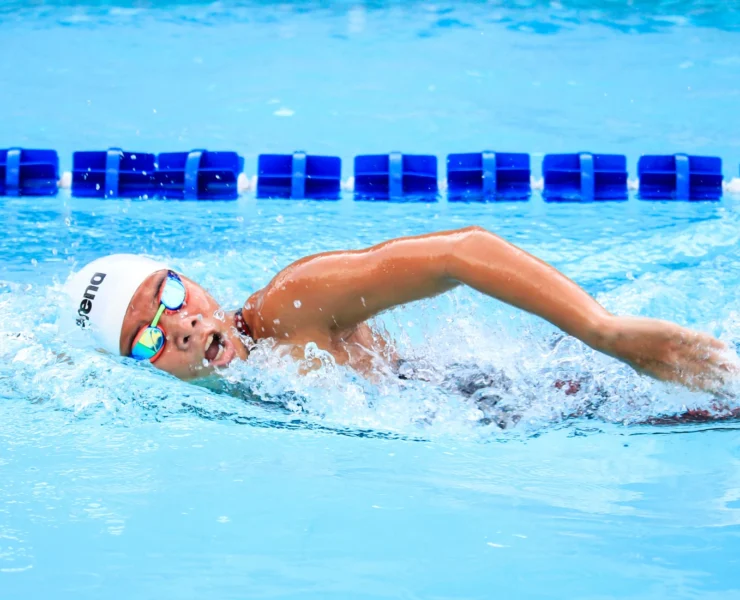 Woman swimming in pool