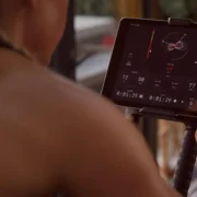 a cycling enthusiast engaging with Wattbike's Hub training app.