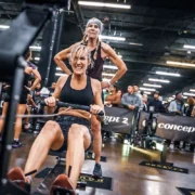 woman rows during a Hyrox event