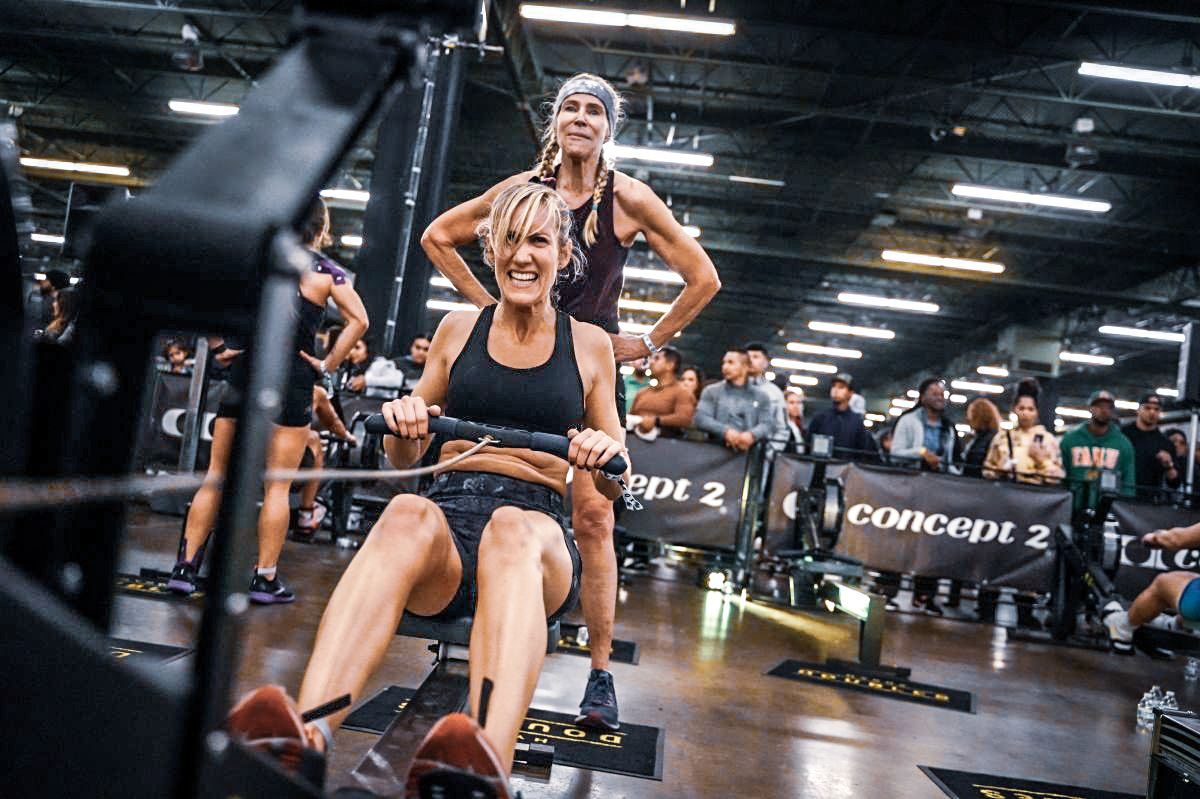 woman rows during a Hyrox event