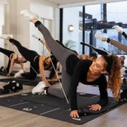 an in-studio Pvolve class with women working out