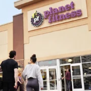 two people about to head into a Planet Fitness