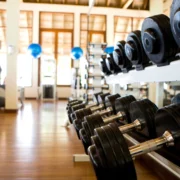 rack of dumbbells inside a gym