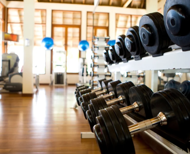 rack of dumbbells inside a gym