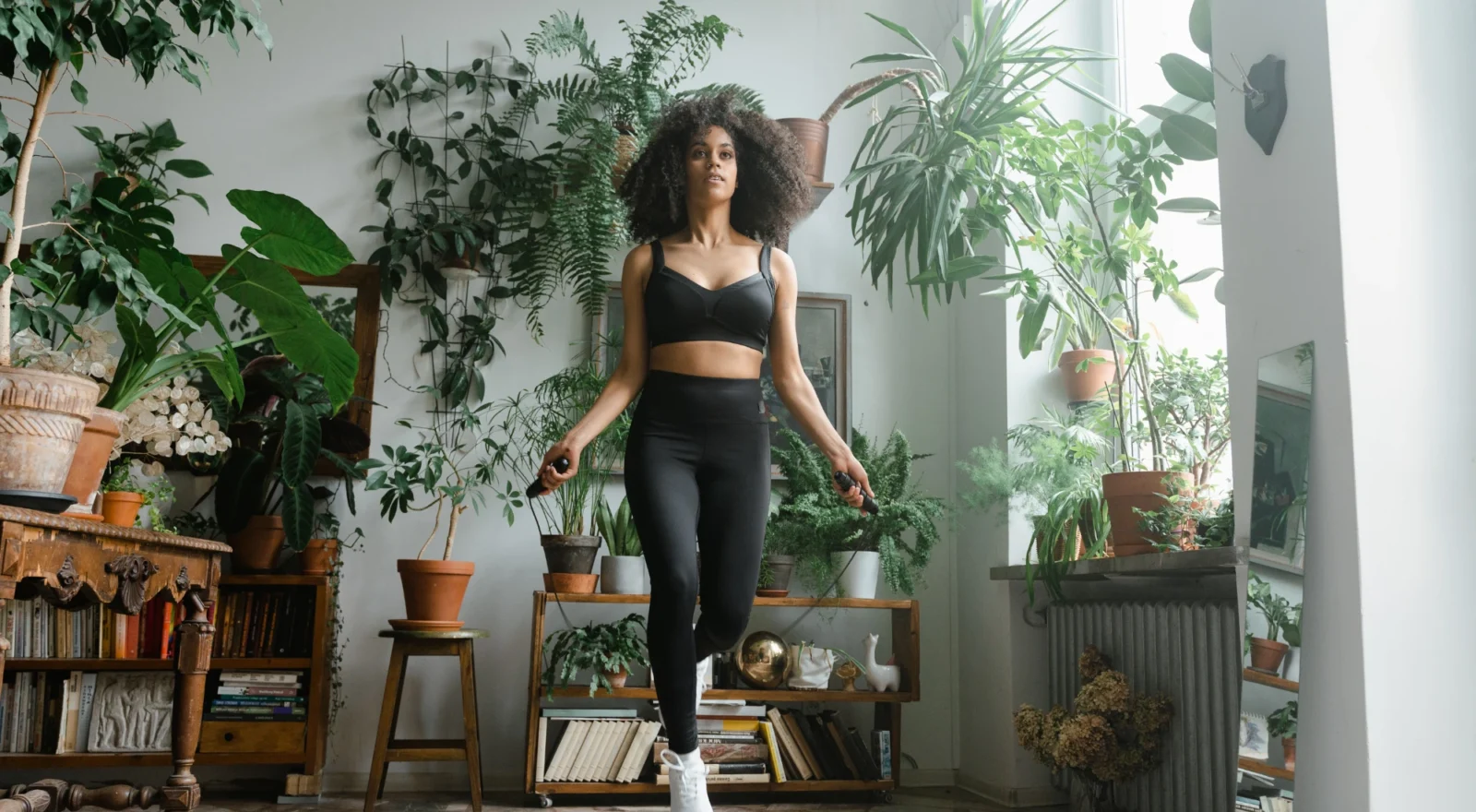 Young black woman jumping rope