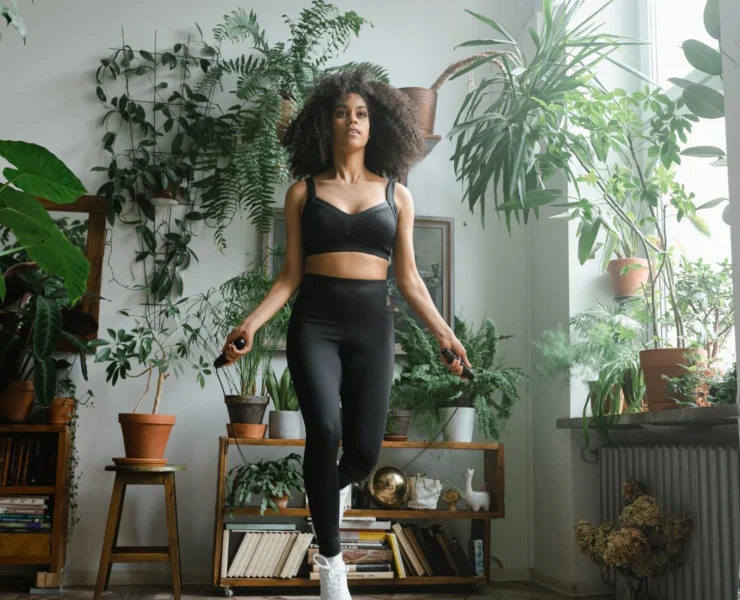 Young black woman jumping rope