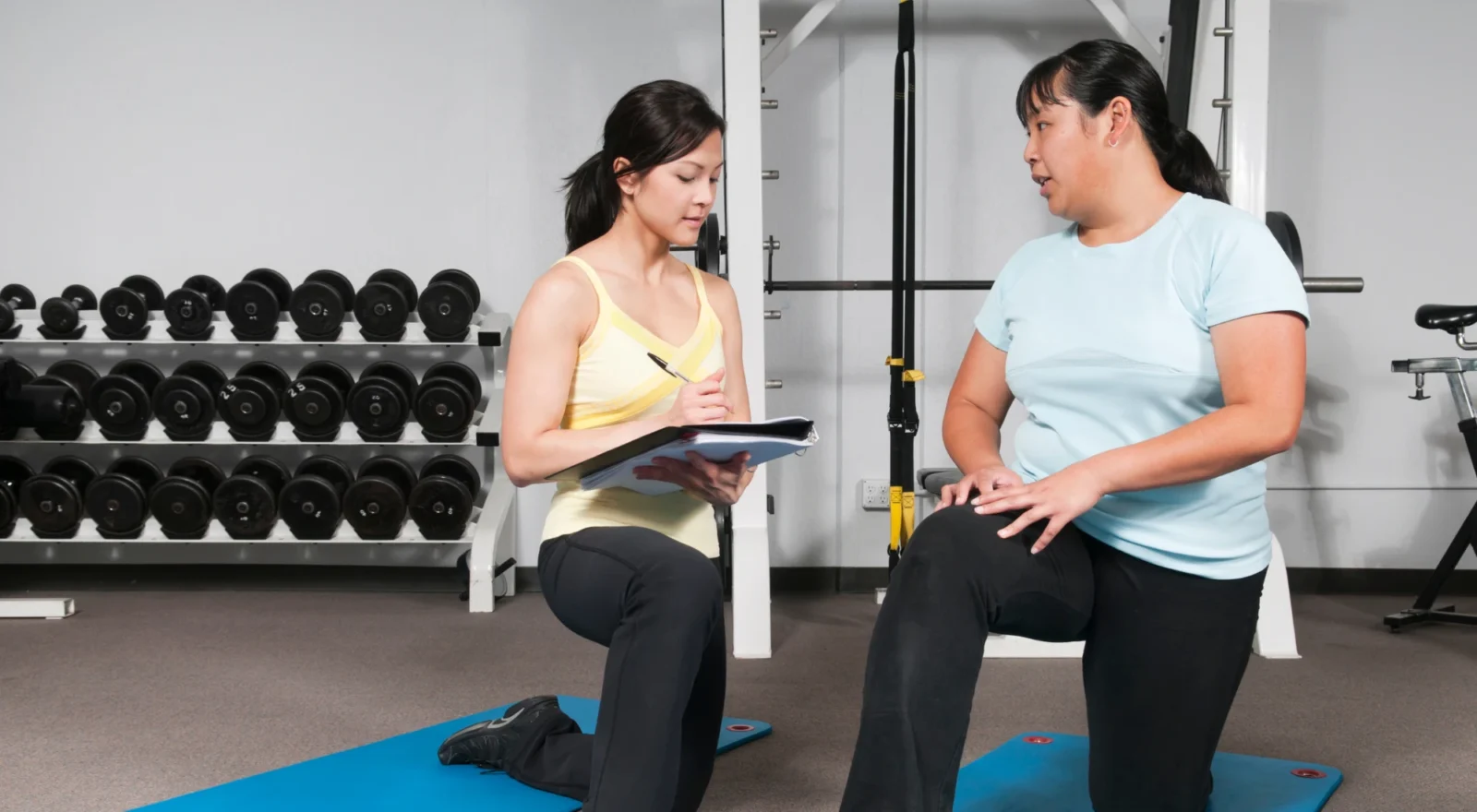 personal trainer with client