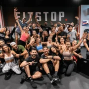 a group of smiling fitness members from Fitstop, a functional fitness franchise