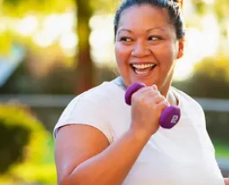 an image of two woman working out together outdoors