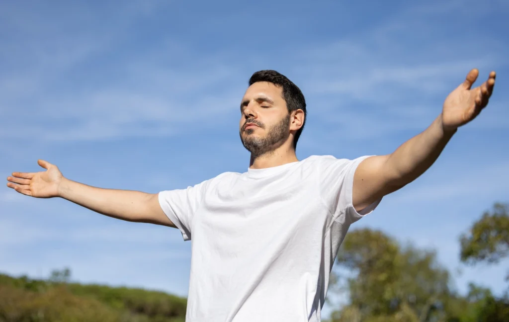 A man practices proper breathwork