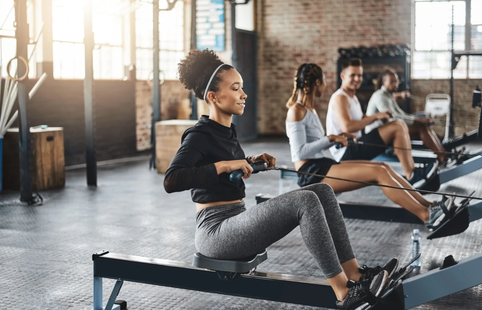 people row during a fitness class