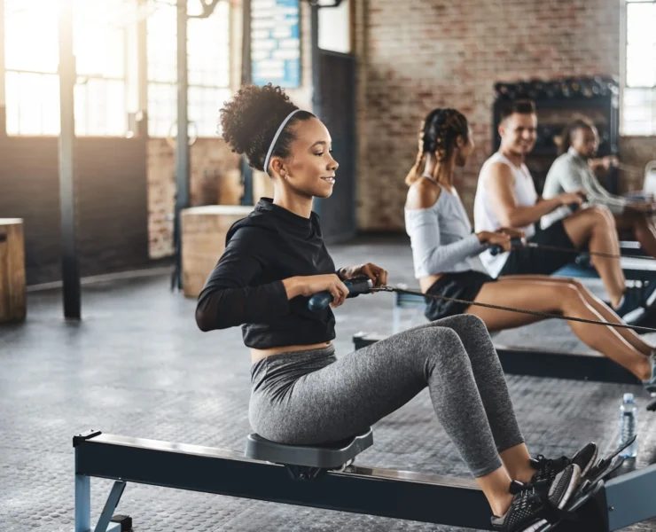 people row during a fitness class