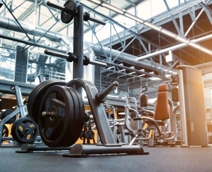 weight stack on the floor of a large gym